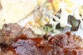 closeup pork steak with sauce and salad vegetables with cream sauce and garlic bread grill Royalty Free Stock Photo