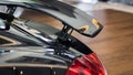 Closeup of the Porsche Cayman S rear wing active aero system