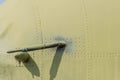 Closeup of port side pitot tube on airplane