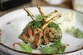 Portion of gourmet lamb cutlets with rice