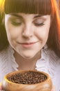 Closeup Portrait of Adorable Caucasian Woman Holding Wooden Cup Royalty Free Stock Photo