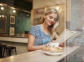 Closeup portrait of ÃÂafe city lifestyle woman sitting in trendy Royalty Free Stock Photo