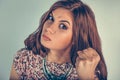 Closeup portrait angry young woman showing fist Royalty Free Stock Photo