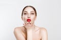 Closeup portrait beautiful attractive, young, happy woman, girlfriend beauty puckering up, sending blowing kiss red black lips Royalty Free Stock Photo