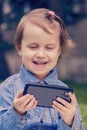 Closeup portrait of beautiful happy little child girl talking on Royalty Free Stock Photo