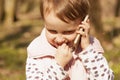 Closeup portrait of beautiful happy little child girl talking on Royalty Free Stock Photo