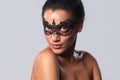 Closeup portrait of beautiful mixed race with black lace mask Royalty Free Stock Photo