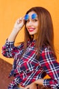 Closeup portrait of beautiful women with perfect make-up and sunglasses reflection, smiling. Concept target, drea