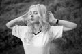 Closeup portrait of a beautiful young blonde woman in the park, the concept of beauty and health. Black and white photo. Royalty Free Stock Photo