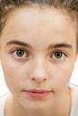 Closeup portrait of a beautiful young girl, with big green eyes Royalty Free Stock Photo