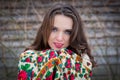 Closeup portrait of beautiful young girl with a traditional Russian or Ukrainian scarf in the winter. Royalty Free Stock Photo