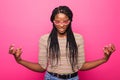 Closeup portrait bitter displeased, angry woman screaming, hands raised, isolated pink background. Negative human emotions, facial