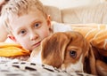 Closeup portrait boy with puppy Royalty Free Stock Photo