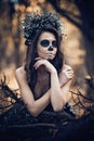 Closeup portrait of Calavera Catrina in black dress. Sugar skull makeup. Dia de los muertos. Day of The Dead. Halloween Royalty Free Stock Photo