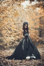 Closeup portrait of Calavera Catrina in black dress. Sugar skull makeup. Dia de los muertos. Day of The Dead. Halloween Royalty Free Stock Photo