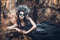 Closeup portrait of Calavera Catrina in black dress. Sugar skull makeup. Dia de los muertos. Day of The Dead. Halloween Royalty Free Stock Photo