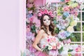 Closeup portrait of Calavera Catrina in pink dress. Sugar skull makeup. Dia de los muertos. Day of The Dead. Halloween Royalty Free Stock Photo