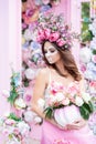 Closeup portrait of Calavera Catrina in pink dress. Sugar skull makeup. Dia de los muertos. Day of The Dead. Halloween Royalty Free Stock Photo