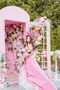 Closeup portrait of Calavera Catrina in pink dress. Sugar skull makeup. Dia de los muertos. Day of The Dead. Halloween Royalty Free Stock Photo