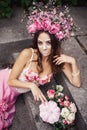 Closeup portrait of Calavera Catrina in pink dress. Sugar skull makeup. Dia de los muertos. Day of The Dead. Halloween Royalty Free Stock Photo
