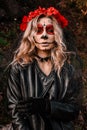 Closeup portrait of Calavera Catrina. Young woman with sugar skull makeup. Dia de los muertos. Day of The Dead Royalty Free Stock Photo