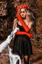 Closeup portrait of Calavera Catrina. Young woman with sugar skull makeup and white spiderweb. Dia de los muertos. Day Royalty Free Stock Photo