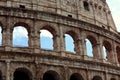 Closeup portrait of Coliseum building old wall with arch in Rome