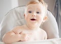 Closeup portrait of cute adorable funny blonde Caucasian smiling laughing baby boy girl Royalty Free Stock Photo