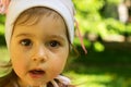 Closeup portrait of Cute kid thinking at the park