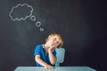 Closeup portrait of Cute little boy thinking deeply about something Copy space Royalty Free Stock Photo