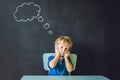 Closeup portrait of Cute little boy thinking deeply about something Copy space Royalty Free Stock Photo