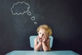 Closeup portrait of Cute little girl thinking deeply about something Copy space Royalty Free Stock Photo