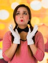 Closeup portrait of cute young girl clown mime looking sad Royalty Free Stock Photo