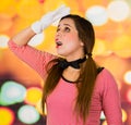 Closeup portrait of cute young girl clown mime looking tired