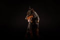 Closeup portrait of Doberman Pinscher Dog Looking in Camera on Black background Royalty Free Stock Photo