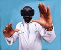 Closeup portrait of doctor using virtual reality goggles and moving hands Royalty Free Stock Photo