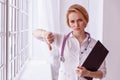 Closeup portrait, doctor woman, giving thumbs down gesture Royalty Free Stock Photo