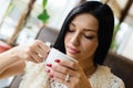 Closeup portrait of drinking coffee or tea beautiful brunette girl young woman having fun gently smiling eyes closed Royalty Free Stock Photo