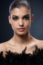 Elegant attractive woman with black boa Royalty Free Stock Photo