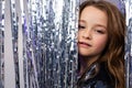 Closeup portrait of a european cute teen girl in a stylish outfit at a birthday party