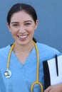 Closeup portrait of friendly, smiling confident female doctor, healthcare professional with scrubs and stethoscope. Patient visit Royalty Free Stock Photo