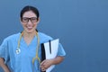 Closeup portrait of friendly, smiling confident female doctor, healthcare professional with scrubs and stethoscope. Patient visit Royalty Free Stock Photo