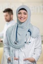 Closeup portrait of friendly, smiling confident muslim female doctor.