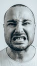 Closeup portrait of funny angry young bully man sticking his tongue out at you camera gesture, isolated on white background. You Royalty Free Stock Photo