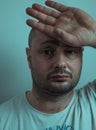 Closeup portrait of funny angry young bully man sticking his tongue out at you camera gesture, isolated on white background. You Royalty Free Stock Photo