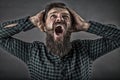 Closeup portrait of a furious young man yelling