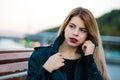 Closeup portrait of glorious young woman with red lips posing at