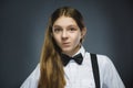 Closeup Portrait of handsome girl with astonished expression while standing against grey background Royalty Free Stock Photo