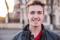 Closeup portrait of a handsome smiling man standing outdoors Royalty Free Stock Photo