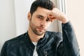 Closeup portrait of handsome thoughtful man posing on white studio background Royalty Free Stock Photo